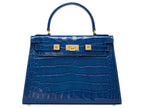 A large cobalt blue ‘croc’ print Italian calf leather handbag with top handle, detachable strap and gold plated hardware