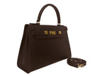 A large brown Italian leather, natural print handbag with gold hardware, a top handle with a detachable strap on a white background.