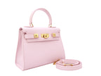 A pale pink, medium-sized, grainy print Italian calf leather handbag with gold-plated hardware, detachable strap and a top handle.