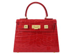 A red 'Croc' print Italian calf leather handbag with gold plated hardware and a top handle.