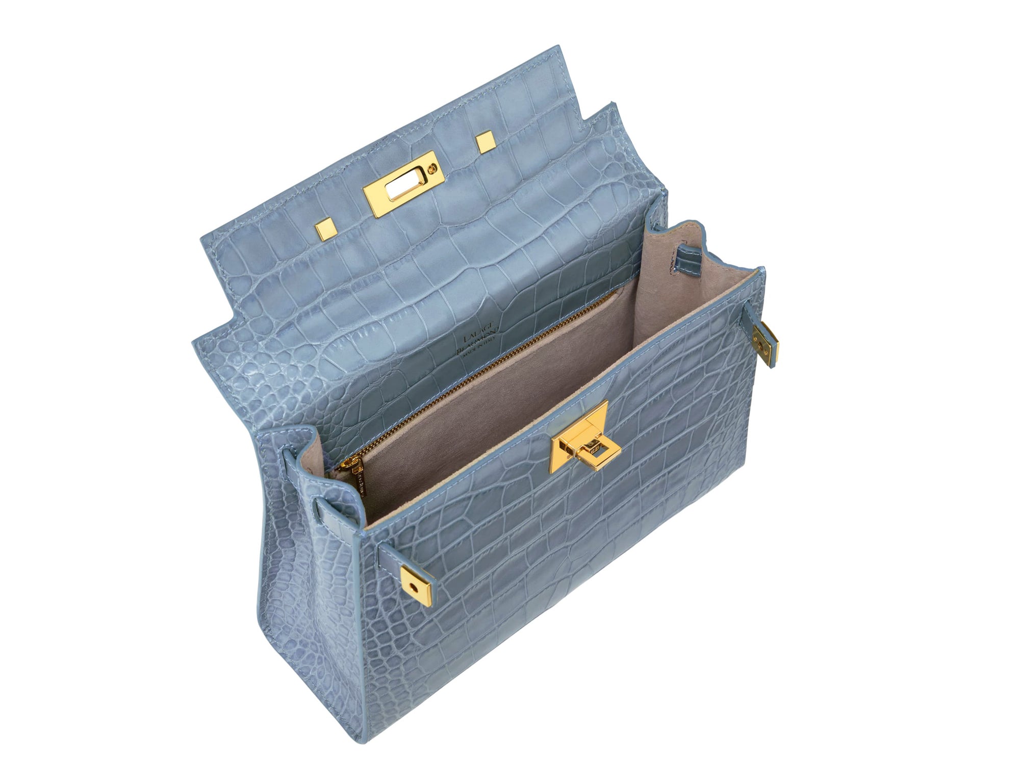 Inside of a large pale blue , ‘croc’ print Italian calf leather handbag with top handle, detachable strap and gold plated hardware