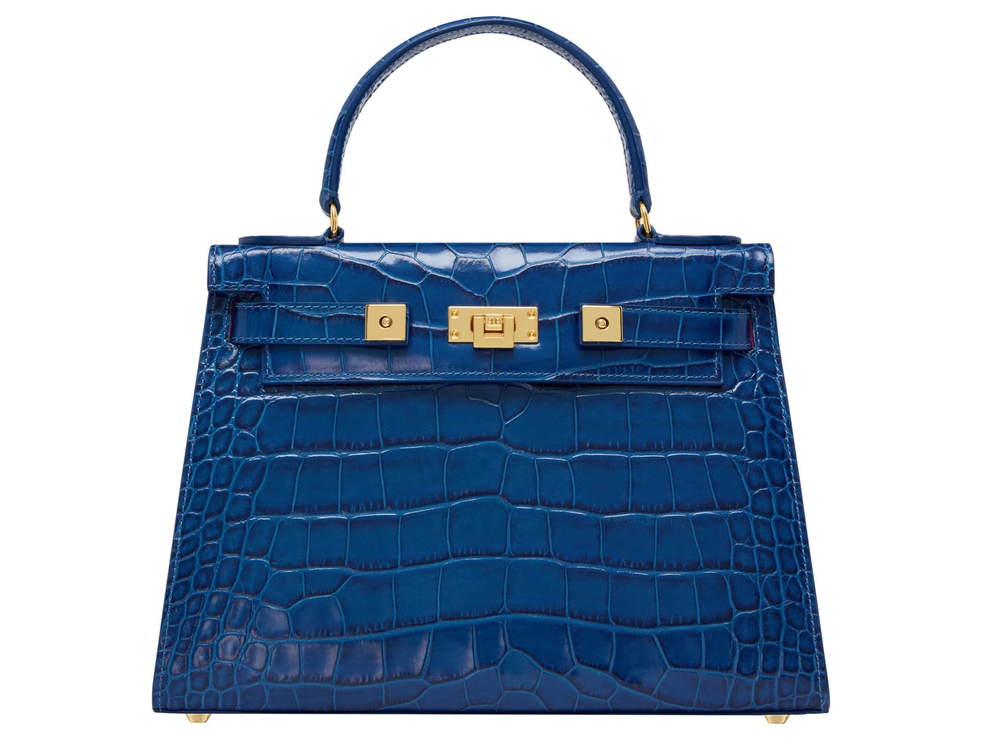 A large cobalt blue ‘croc’ print Italian calf leather handbag with top handle, detachable strap and gold plated hardware