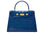 A large cobalt blue ‘croc’ print Italian calf leather handbag with top handle, detachable strap and gold plated hardware