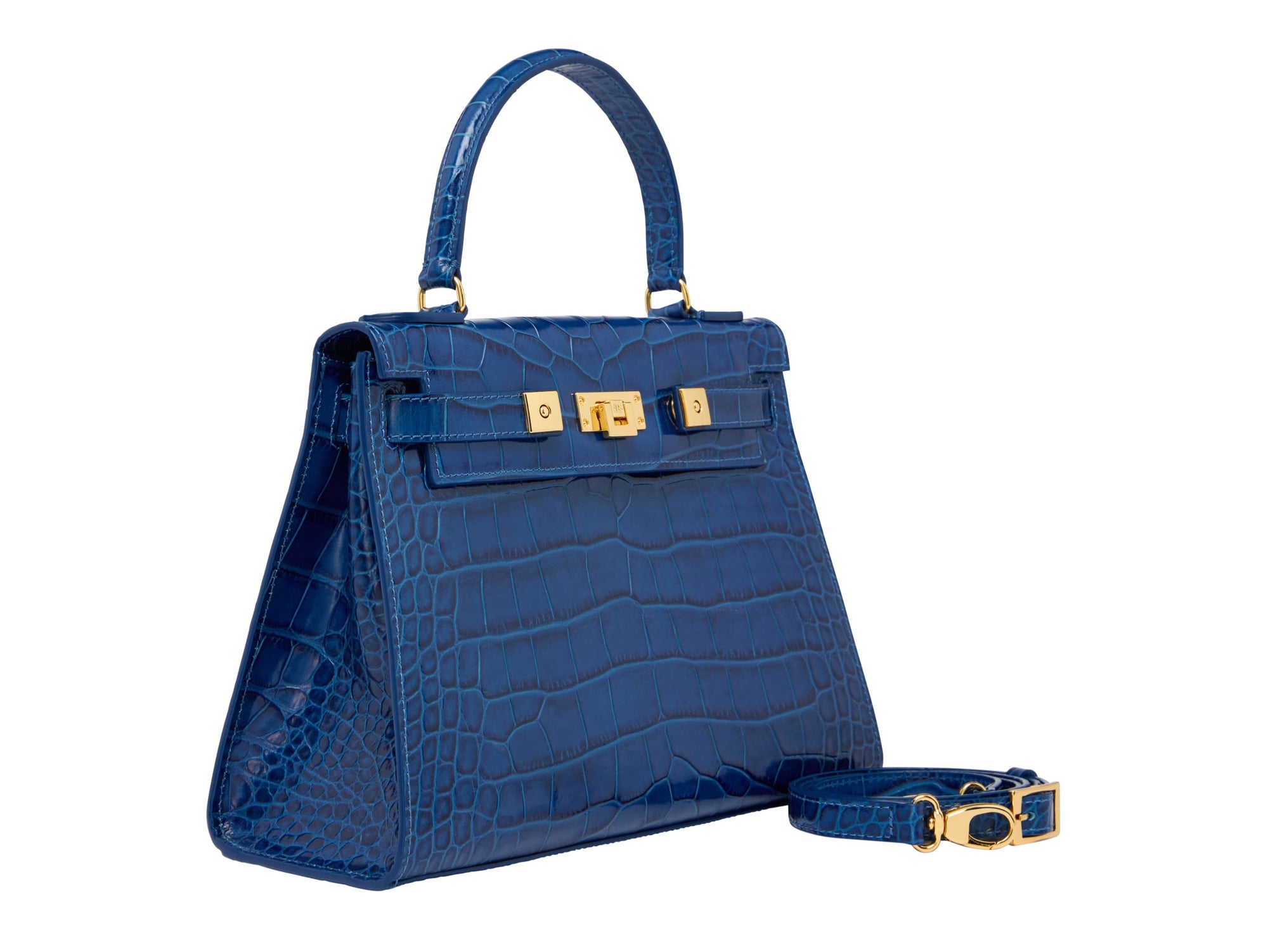 A large cobalt blue ‘croc’ print Italian calf leather handbag with top handle, detachable strap and gold plated hardware