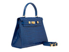 A large cobalt blue ‘croc’ print Italian calf leather handbag with top handle, detachable strap and gold plated hardware