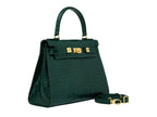 A large dark green ‘croc’ print Italian calf leather handbag with top handle, detachable strap and gold plated hardware
