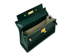 Inside of a large dark green ‘croc’ print Italian calf leather handbag with top handle, detachable strap and gold plated hardware showing grey suede interior