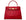 A large red, ‘croc’ print Italian calf leather handbag with top handle, detachable strap and gold plated hardware.