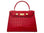 A large red, ‘croc’ print Italian calf leather handbag with top handle, detachable strap and gold plated hardware.