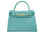 A large turquoise , ‘croc’ print Italian calf leather handbag with top handle, detachable strap and gold plated hardware.
