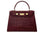 A large wine ‘croc’ print Italian calf leather handbag with top handle, detachable strap and gold plated hardware with magnetic fastening.