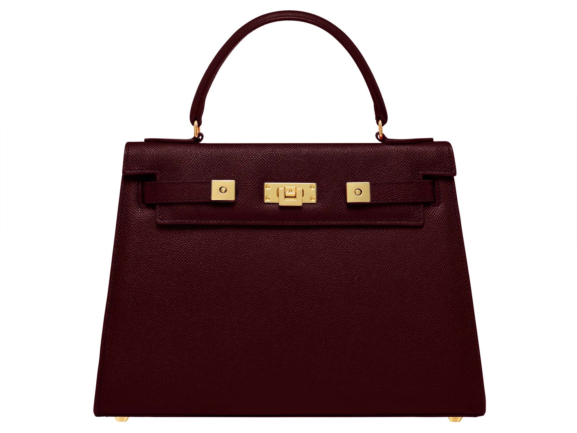 A wine-colored, pebble print Italian calf leather handbag with gold plated hardware, top handle and detachable strap in a structured design.