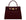 A wine-colored, pebble print Italian calf leather handbag with gold plated hardware, top handle and detachable strap in a structured design.
