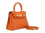 An orange luxury handbag with a top handle and gold-plated hardware, made of Italian calf leather.