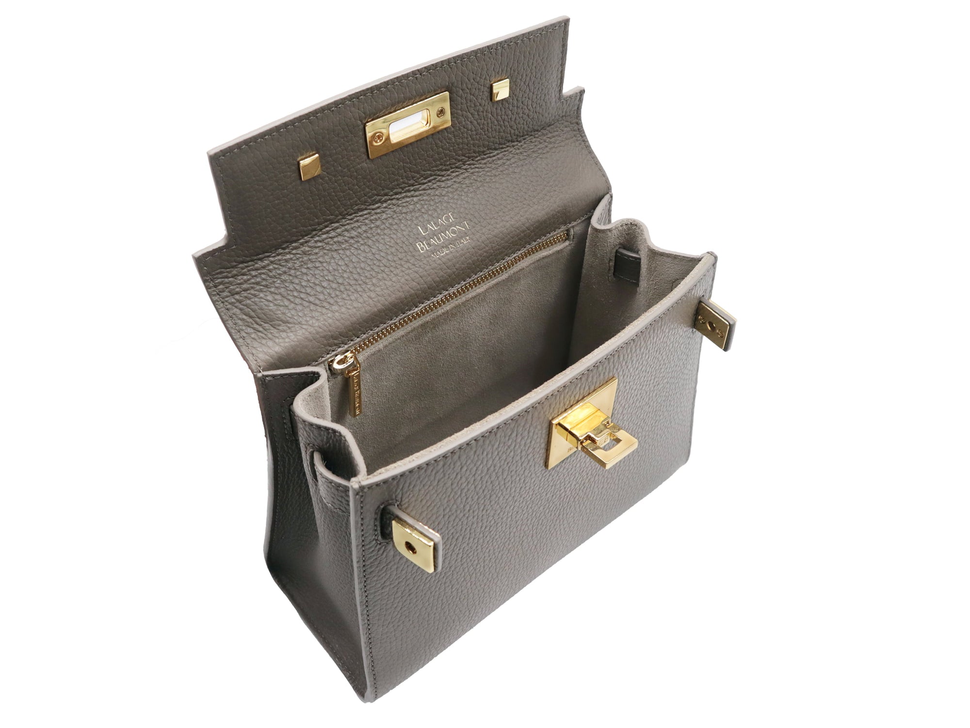 Inside view of a taupe colored, medium-sized handbag made from grainy print Italian calf leather, featuring gold-plated hardware and a top handle with a detachable shoulder strap.