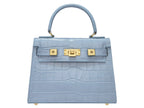A blue 'Croc' print Italian calf leather handbag with gold plated hardware and a top handle.