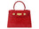 A red 'Croc' print Italian calf leather handbag with gold plated hardware and a top handle.