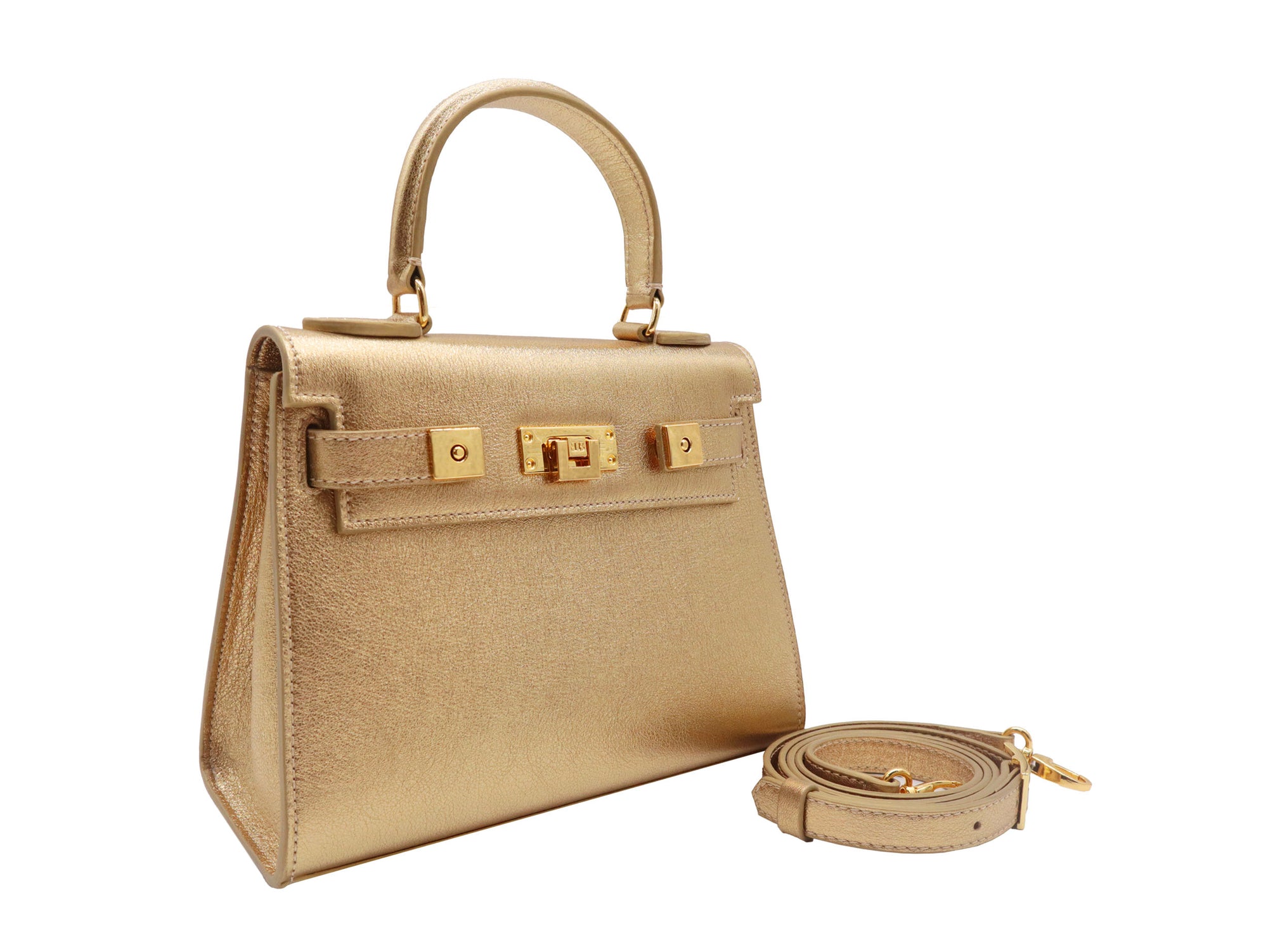 Medium gold natural grain Italian leather handbag with gold hardware, a top handle and a detachable strap on a white background